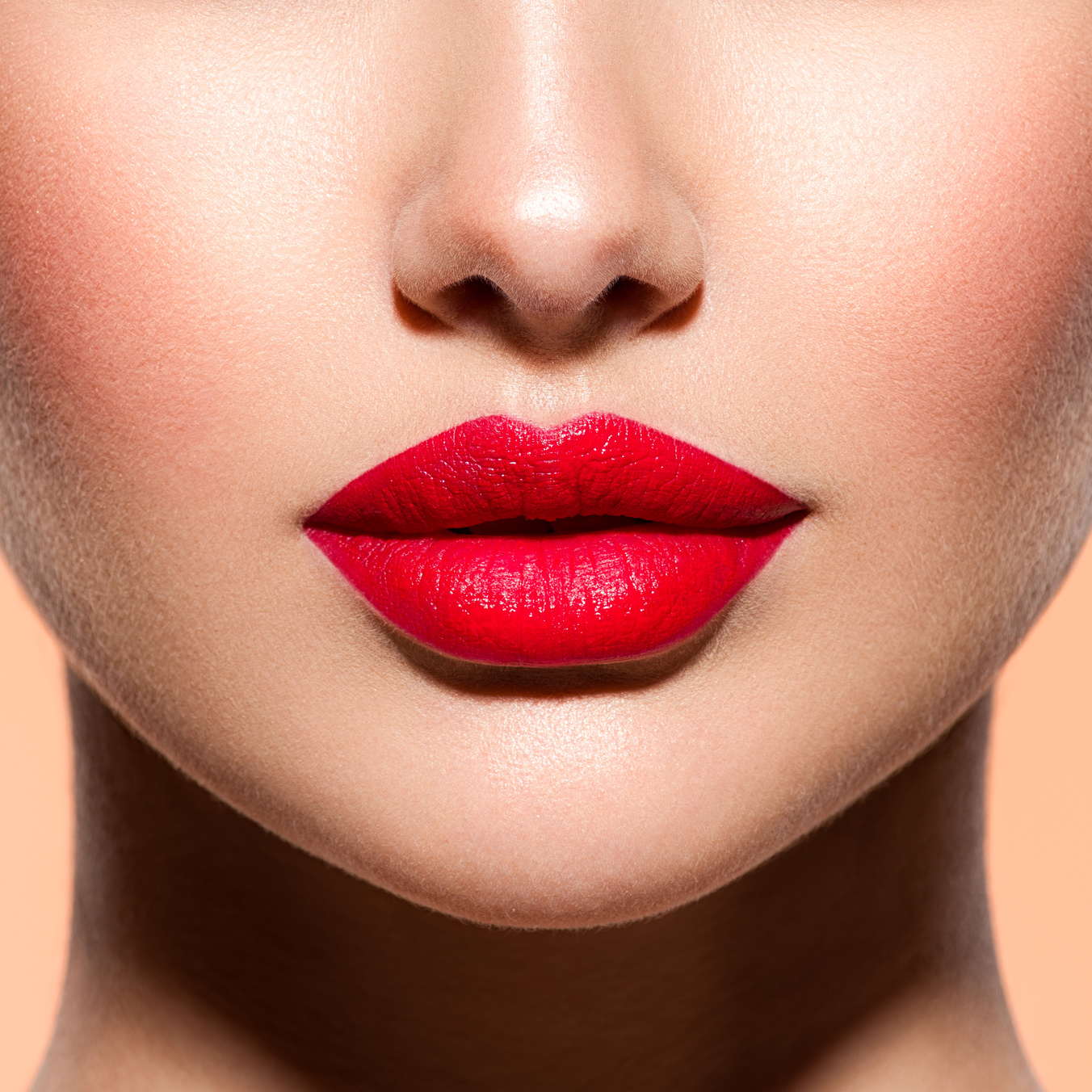 Woman Lips with a Red Lipstick on Lips. Closeup Female Red Lips.